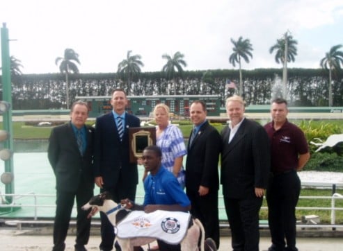 WSOP Circuit Staff at PBKC 2013 Nolan Dalla at Palm Beach Kennel Club with Winning Dog